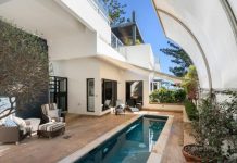 Spring weather sees Noosa auctions bring out the bidders