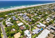 Relax in sun-soaked luxury by the beach