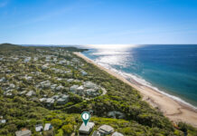 Private Beach House with Coral Sea Views; Rich Investment Potential Metres to Sand and Sea