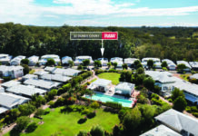 Immaculate Coastal Home in Gated Village